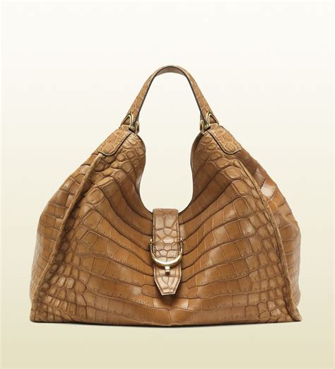 gucci soft stirrup crocodile shoulder bag expensive